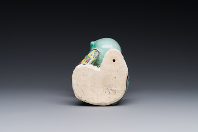 A Chinese famille rose figure of a lady with a bowl, Yongzheng
