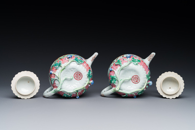 A pair of Chinese famille rose 'boy and buffalo' teapots, Yongzheng