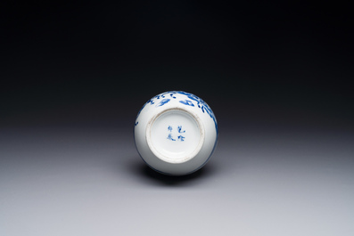 A Chinese blue, white and copper-red vase with warriors on horseback, Qianlong mark, 19th C.