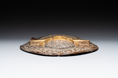 A Tibetan gilt copper 'Mahakala' plaque, 19th C.