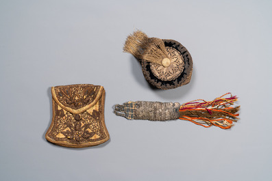 An Iranian gold-thread-embroidered silk caftan, a hat, a coin bracelet and a Koran holder, 19th C.