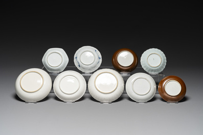 Nine Chinese blue and white, famille rose and Imari-style cups and saucers, Kangxi/Qianlong