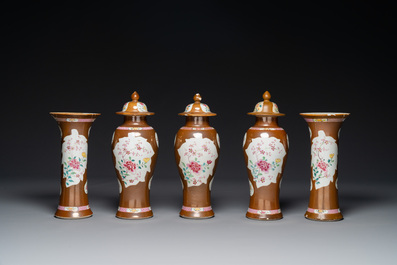 A Chinese capucin-brown-ground famille rose garniture of five vases with floral design, Qianlong