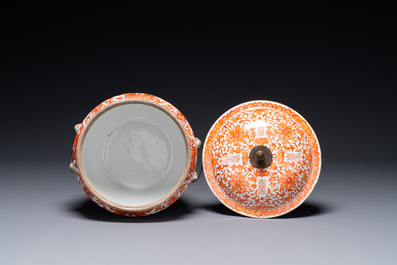 A Chinese iron-red-decorated covered bowl and a famille rose covered bowl, 19th C.