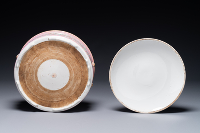 A Chinese iron-red-decorated covered bowl and a famille rose covered bowl, 19th C.