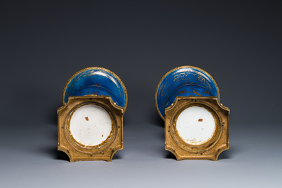 A pair of Chinese gilt-decorated powder-blue 'yenyen' vases with gilt bronze mounts, Kangxi