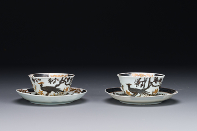 A pair of Chinese grisaille and gilt 'pheasant' cups and saucers, Yongzheng