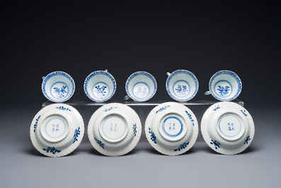 Five Chinese blue and white cups and four saucers with boys carrying a vase, Kangxi mark, Guangxu