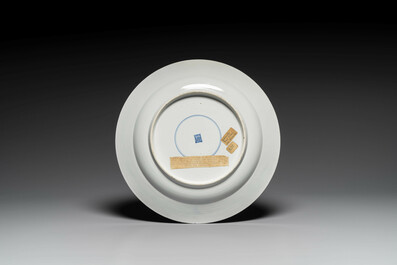 A Chinese blue and white 'antiquities' dish, Kangxi