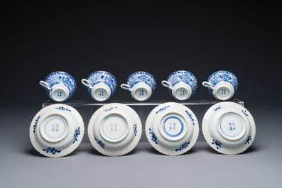 Five Chinese blue and white cups and four saucers with boys carrying a vase, Kangxi mark, Guangxu