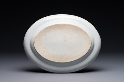 An oval Chinese monogrammed Canton famille rose dish with landscape design, 19th C.