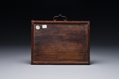 A rectangular Chinese famille verte plaque in a wooden faux bamboo frame, Kangxi