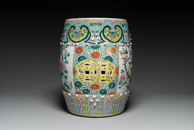 A Chinese famille rose garden seat with birds among blossoming branches, 19th C.