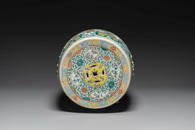 A Chinese famille rose garden seat with birds among blossoming branches, 19th C.