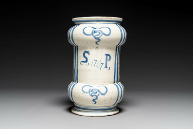 A large Italian blue, white and manganese albarello drug jar inscribed Charitas, probably Savona, dated 1767