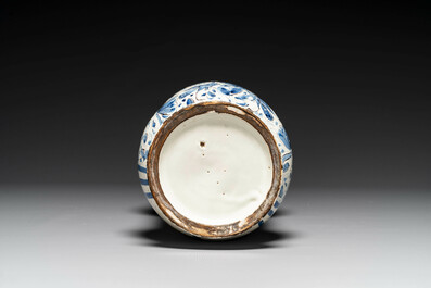 A large Italian blue, white and manganese albarello drug jar inscribed Charitas, probably Savona, dated 1767