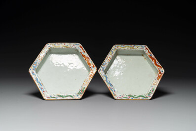 A pair of hexagonal Chinese Canton famille rose jardinieres on stands, 19th C.