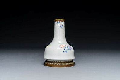 A Chinese famille rose vase with gilt bronze mounts, Escalier de Cristal, Paris, Yongzheng