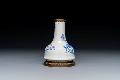 A Chinese famille rose vase with gilt bronze mounts, Escalier de Cristal, Paris, Yongzheng