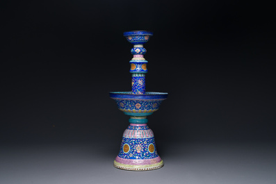 A large Chinese Canton enamel blue-ground 'shou' candlestick, Qianlong/Jiaqing