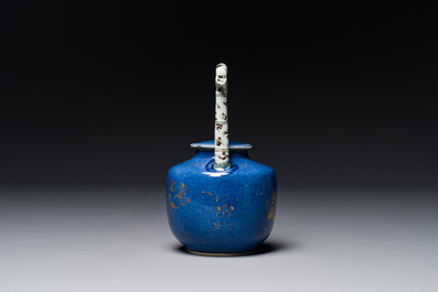 A Chinese gilt-decorated powder-blue teapot and cover with a faux-bamboo handle, Kangxi