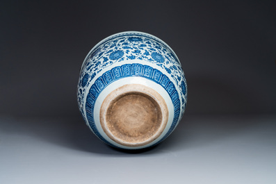A large Chinese blue and white 'peony scroll' fish bowl, Qianlong/Jiaqing