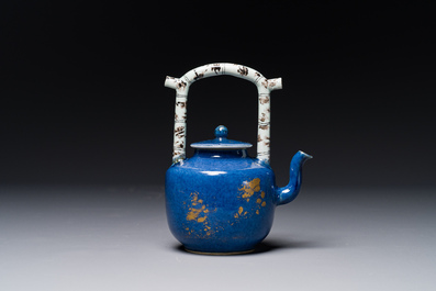 A Chinese gilt-decorated powder-blue teapot and cover with a faux-bamboo handle, Kangxi