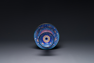 A large Chinese Canton enamel blue-ground 'shou' candlestick, Qianlong/Jiaqing