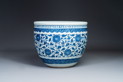 A large Chinese blue and white 'peony scroll' fish bowl, Qianlong/Jiaqing