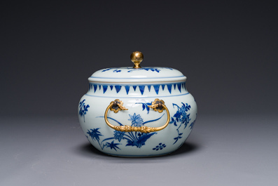 A Chinese blue and white covered bowl with floral design and gilt bronze mounts, Transitional period