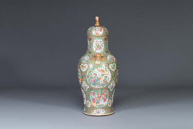 A large Chinese Canton famille rose vase and cover with narrative design, 19th C.