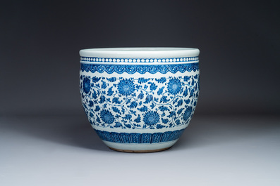 A large Chinese blue and white 'peony scroll' fish bowl, Qianlong/Jiaqing