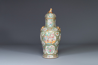 A large Chinese Canton famille rose vase and cover with narrative design, 19th C.