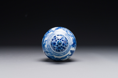A Chinese blue and white covered vase with fishermen in a river landscape, jade mark, Kangxi