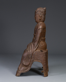 A Chinese cast iron figure of a dignitary, dated 1722