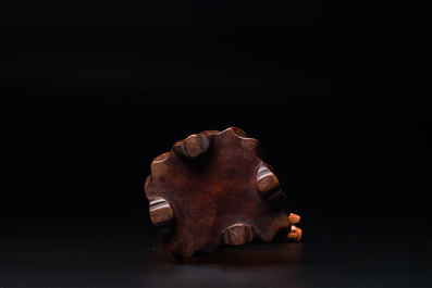 A Chinese red coral figure of Xiwangmu on wooden stand, 19/20th C.