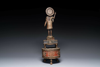 An Indo-Portuguese wooden sculpture of John the Baptist with a lamb, dated 1704