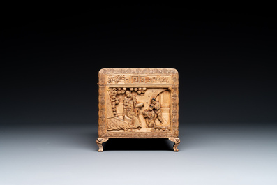 A Chinese Canton carved wooden casket with a famille rose plaque, Republic