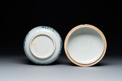 A pair of large Chinese famille rose jars and covers with floral design, Qianlong