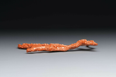 A Chinese red coral 'Eight Immortals' group on wooden stand, 19/20th C.