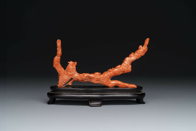 A Chinese red coral 'Eight Immortals' group on wooden stand, 19/20th C.