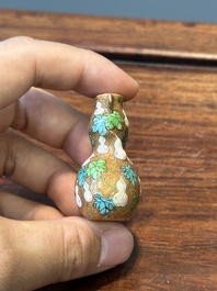 Two Chinese miniature vases and a snuff bottle with Qianlong mark, Kangxi and later