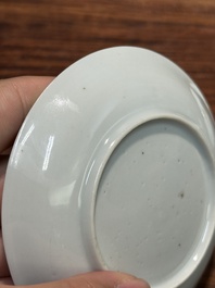 A pair of Chinese famille rose 'peony' cups and saucers, Yongzheng