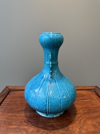 A Chinese monochrome powder-blue garlic-mouth vase with chilong handles, 18/19th C.