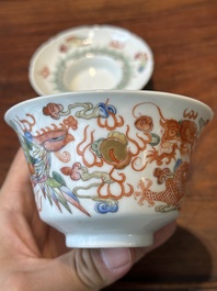 Four Chinese famille rose covered bowls, three with saucers and a 'dragon' bowl, signed Wang Darong 王大榕, 19/20th C.
