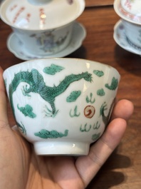 Four Chinese famille rose covered bowls, three with saucers and a 'dragon' bowl, signed Wang Darong 王大榕, 19/20th C.