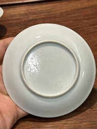 A pair of Chinese famille rose 'peony' cups and saucers, Yongzheng
