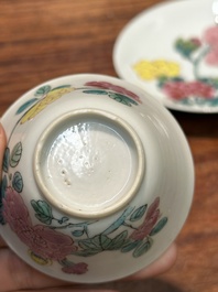 A pair of Chinese famille rose 'peony' cups and saucers, Yongzheng