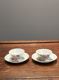 A pair of Chinese famille rose 'peony' cups and saucers, Yongzheng