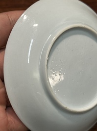 A pair of Chinese famille rose 'peony' cups and saucers, Yongzheng